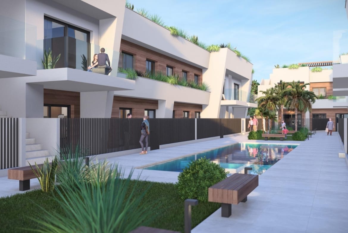 New-Construction-Homes-in-Torre-Pacheco-Costa-Calida-6 Modern luxury penthouse in Torre-Pacheco featuring a sleek pool, landscaped courtyard, and bright communal terrace areas.