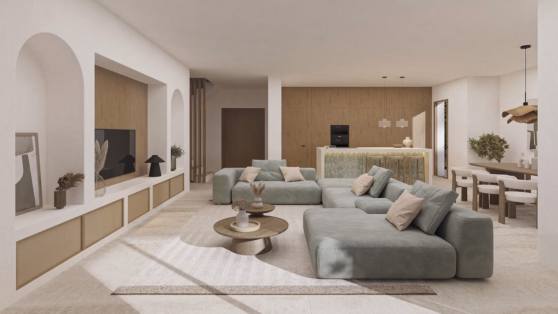 Bright, elegant open-plan living room with modern kitchen and dining area in a luxury 4-bedroom Ibizan villa in La Fustera, Benissa.