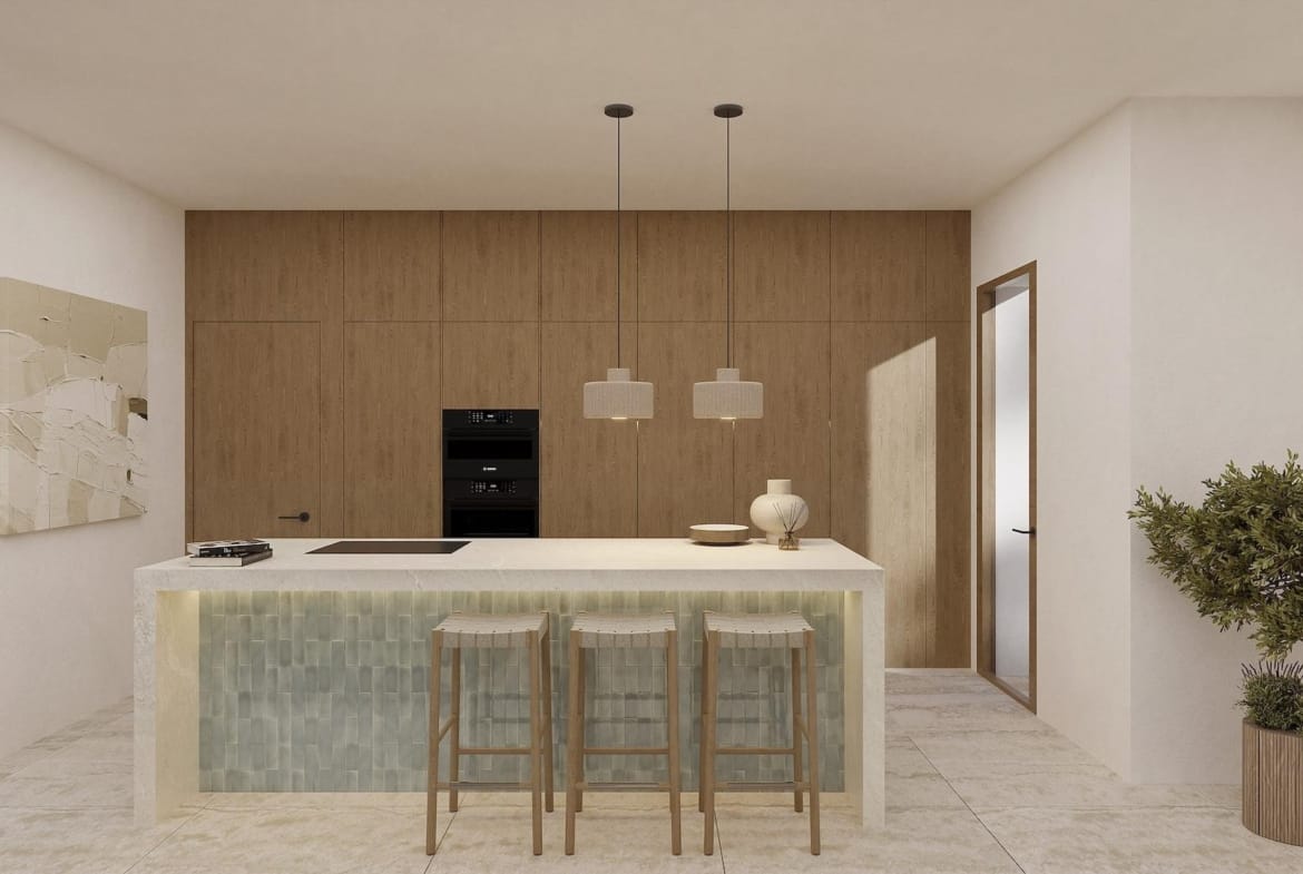 Bright modern kitchen with wooden cabinetry and breakfast bar in luxury 4-bedroom Ibizan villa in La Fustera, Benissa