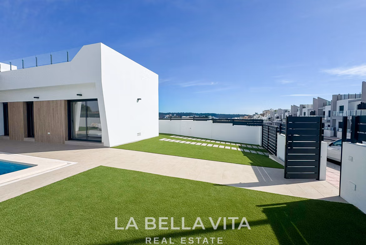 Sun-drenched modern 3-bedroom villa exterior with private pool, spacious terrace, and solarium in San Miguel de Salinas.