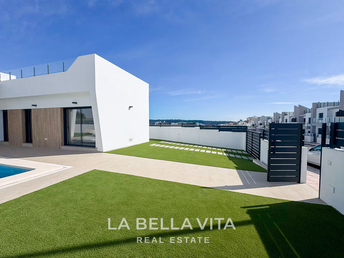 Sun-drenched modern 3-bedroom villa exterior with private pool, spacious terrace, and solarium in San Miguel de Salinas.