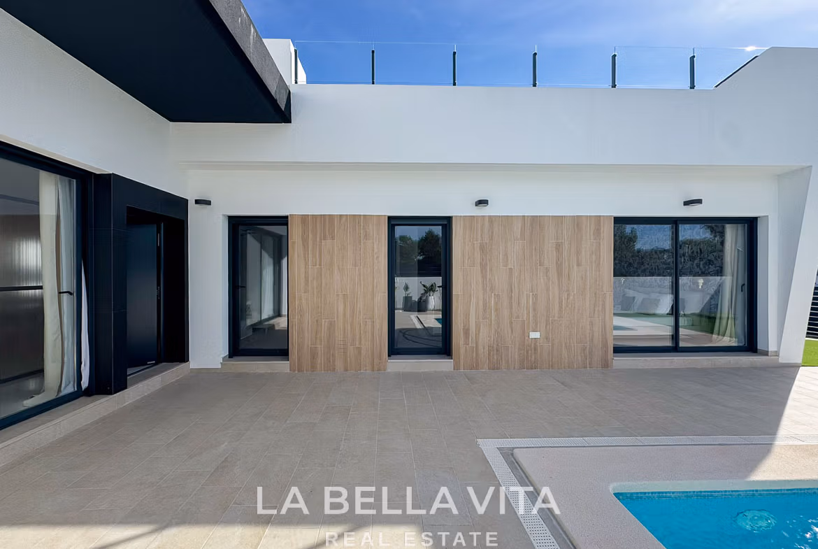 Modern 3-bedroom villa in San Miguel de Salinas with a sleek private pool and sunlit terrace in a minimalist design.