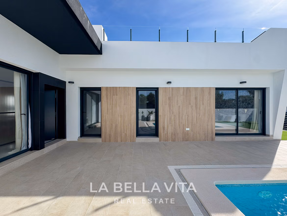 Modern 3-bedroom villa in San Miguel de Salinas with a sleek private pool and sunlit terrace in a minimalist design.