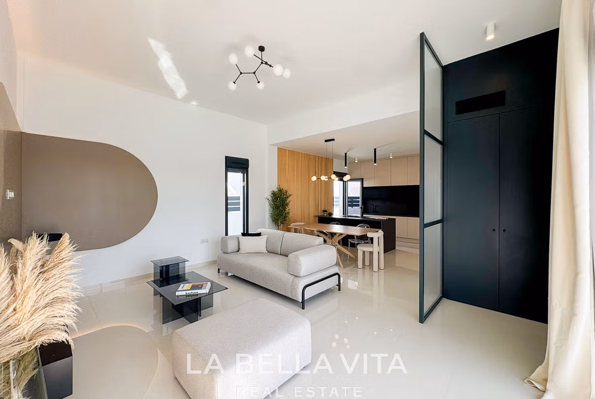 Bright and modern open-plan living and kitchen area in a stylish 3-bedroom villa in San Miguel de Salinas.