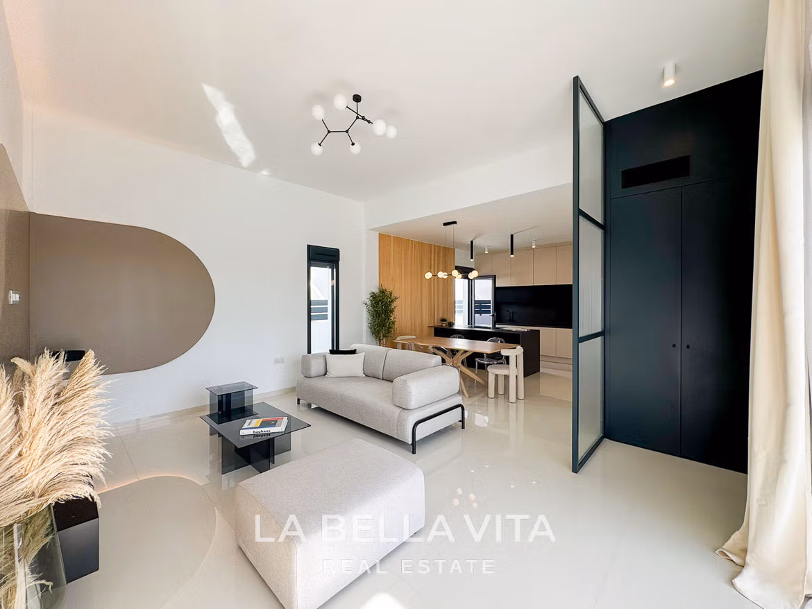 Bright and modern open-plan living and kitchen area in a stylish 3-bedroom villa in San Miguel de Salinas.