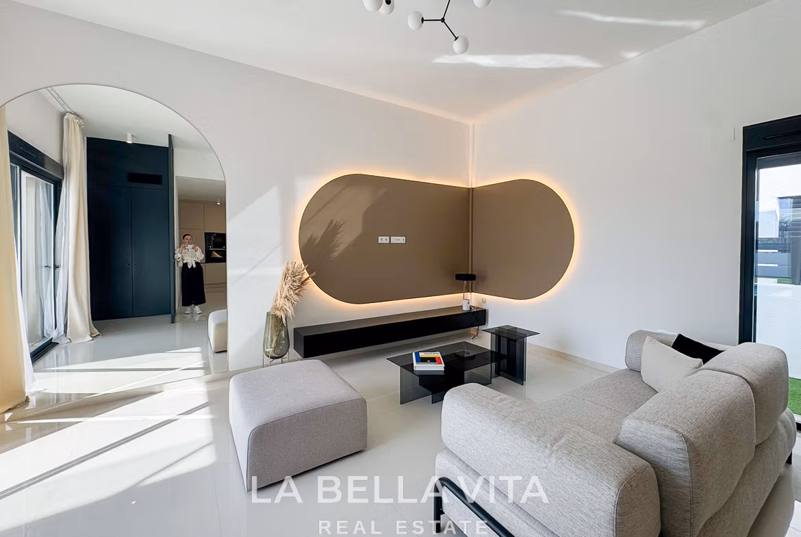 Bright and modern living room with sleek design in 3-bedroom villa featuring elegant details in San Miguel de Salinas.