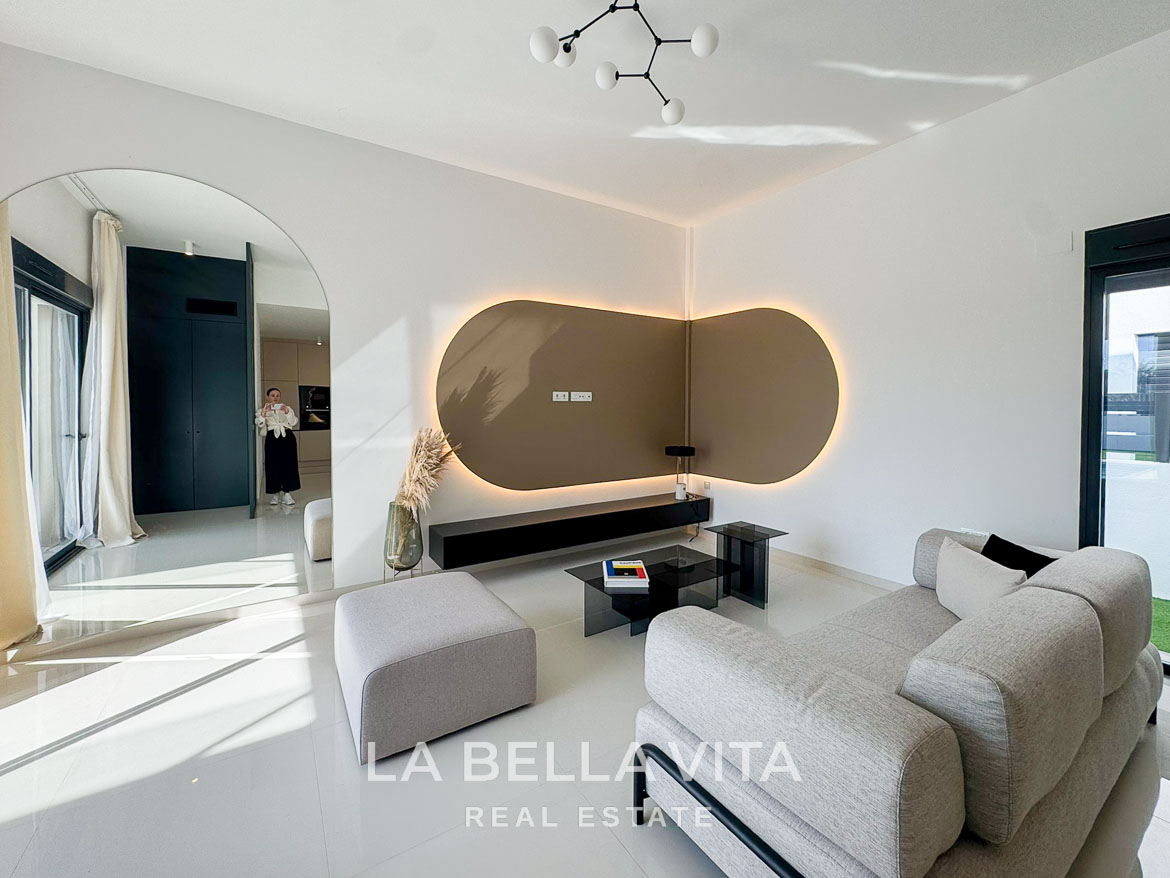 Bright and modern living room with sleek design in 3-bedroom villa featuring elegant details in San Miguel de Salinas.