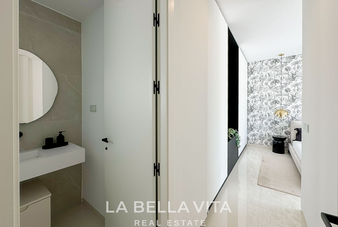 Bright modern hallway with sleek bathroom and stylish bedroom in a new 3-bedroom villa in San Miguel de Salinas