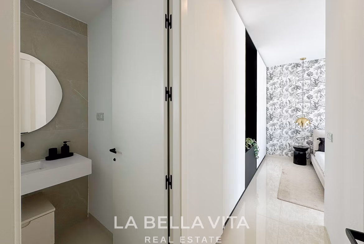 Bright modern hallway with sleek bathroom and stylish bedroom in a new 3-bedroom villa in San Miguel de Salinas