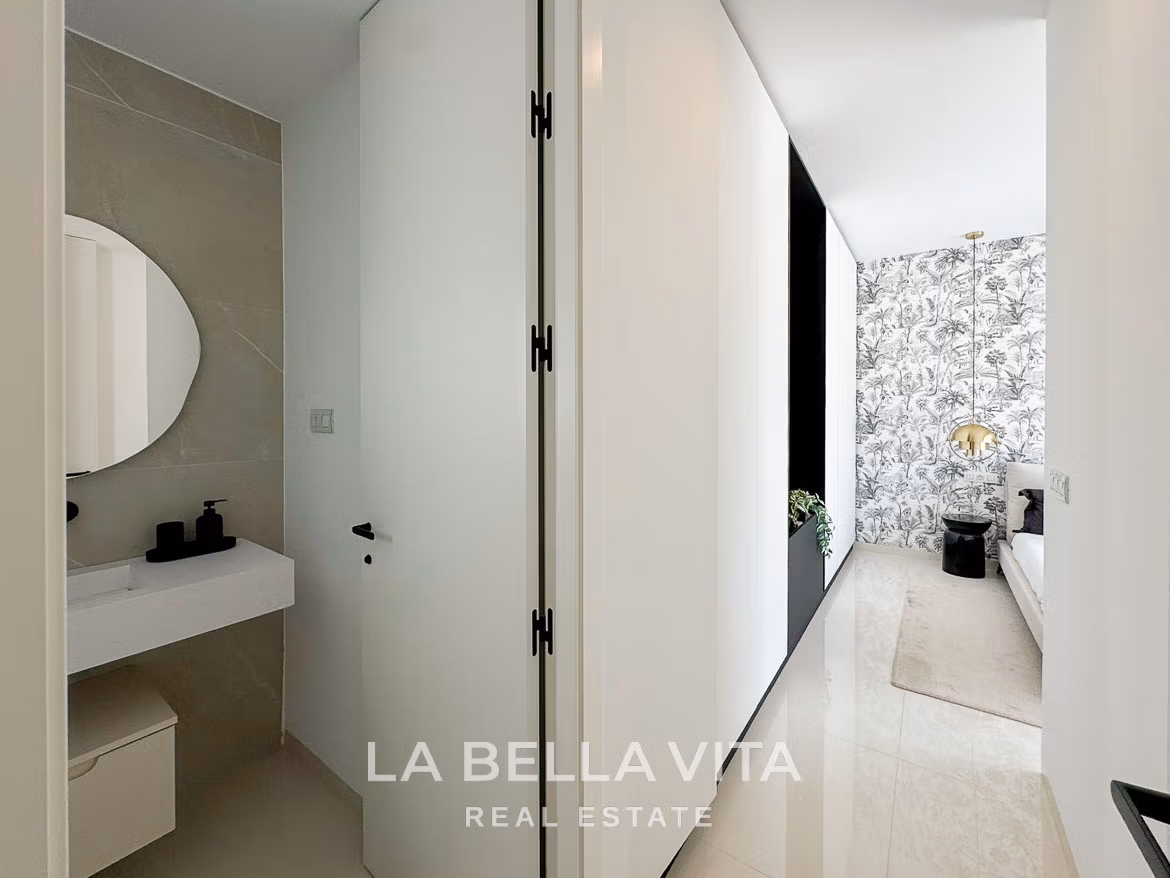 Bright modern hallway with sleek bathroom and stylish bedroom in a new 3-bedroom villa in San Miguel de Salinas