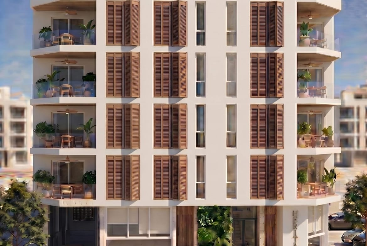 Modern white facade with wooden shutters and balconies of a furnished new build studio apartment in Lo Pagán, San Pedro del Pinatar.