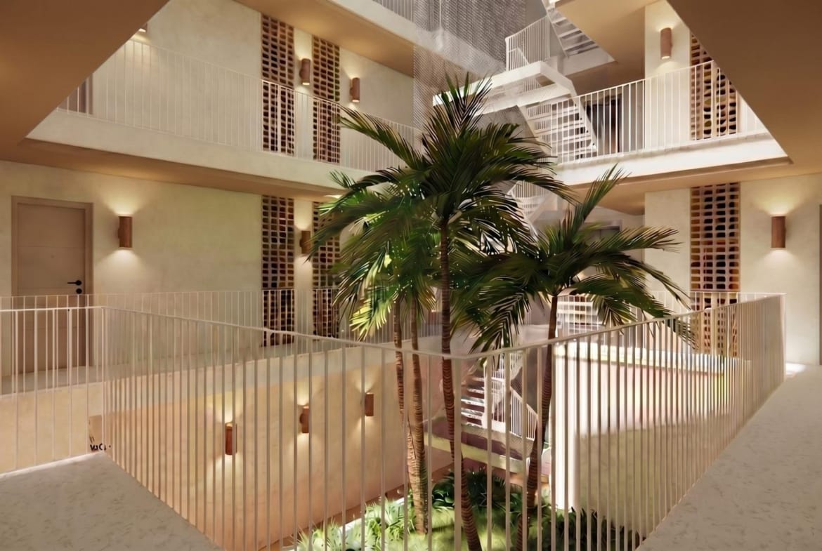 Elegant sunlit interior courtyard with lush palm trees and modern staircase in furnished new build 2-bedroom apartment, Lo Pagán.