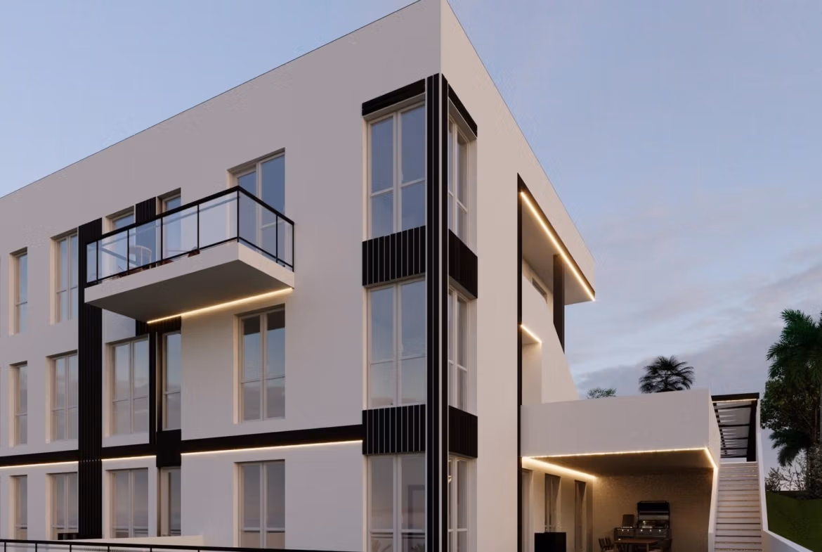 Tourist-Licensed-New-Build-Apartments-in-Finestrat-Investment-Opportunity-Near-Golf-and-Benidorm-4 Modern smart new build 1-bedroom apartment exterior in Finestrat, Benidorm with sleek glass balconies and elegant outdoor lounge area.
