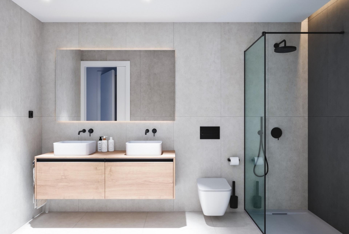 Modern bathroom in exclusive new build home in Pilar de la Horadada with sleek double sinks, minimalist fixtures, and...