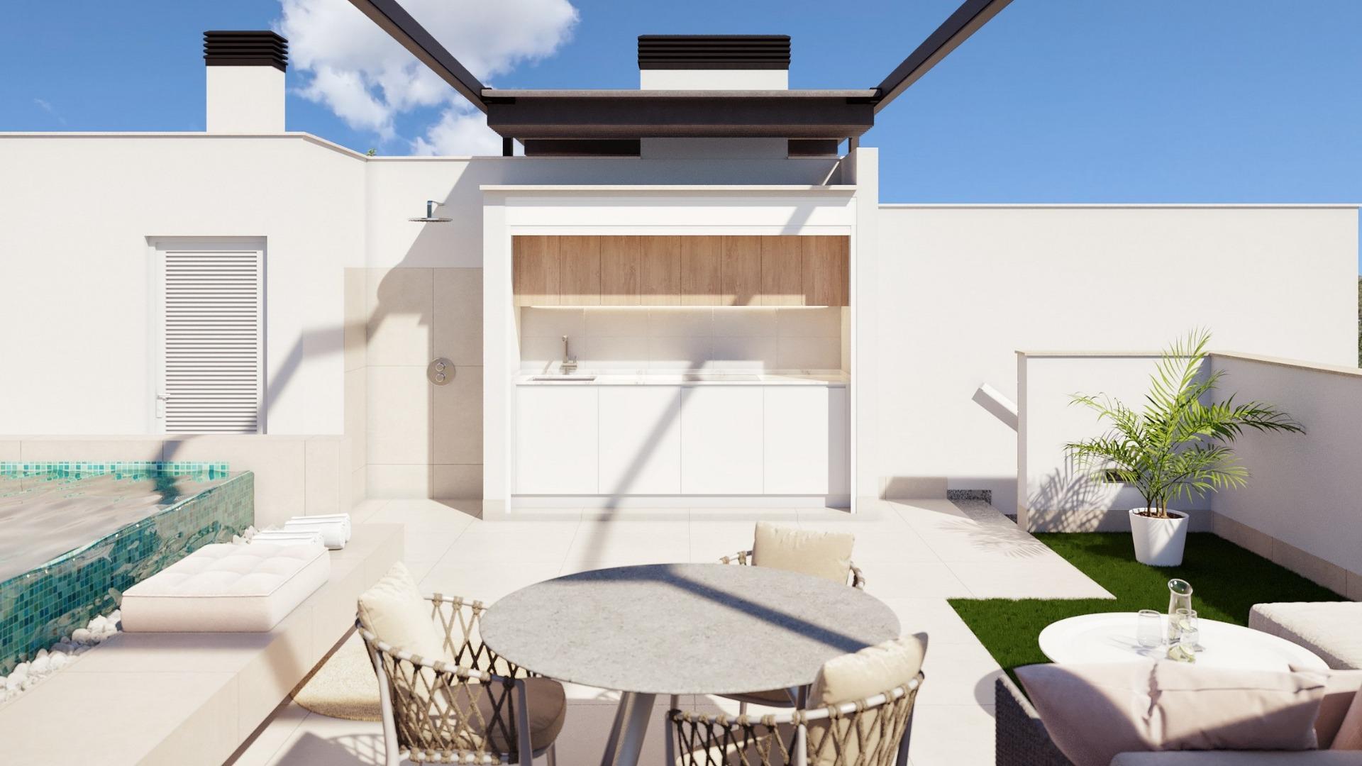 Sun-drenched modern ground floor home terrace in Pilar de la Horadada with sleek outdoor kitchen, seating, and private...