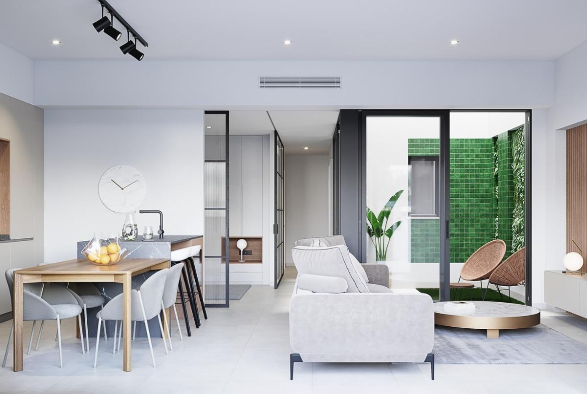 Bright and modern 3-bedroom ground floor home with sleek kitchen, cozy living area, and green tiled patio in Pilar de la...