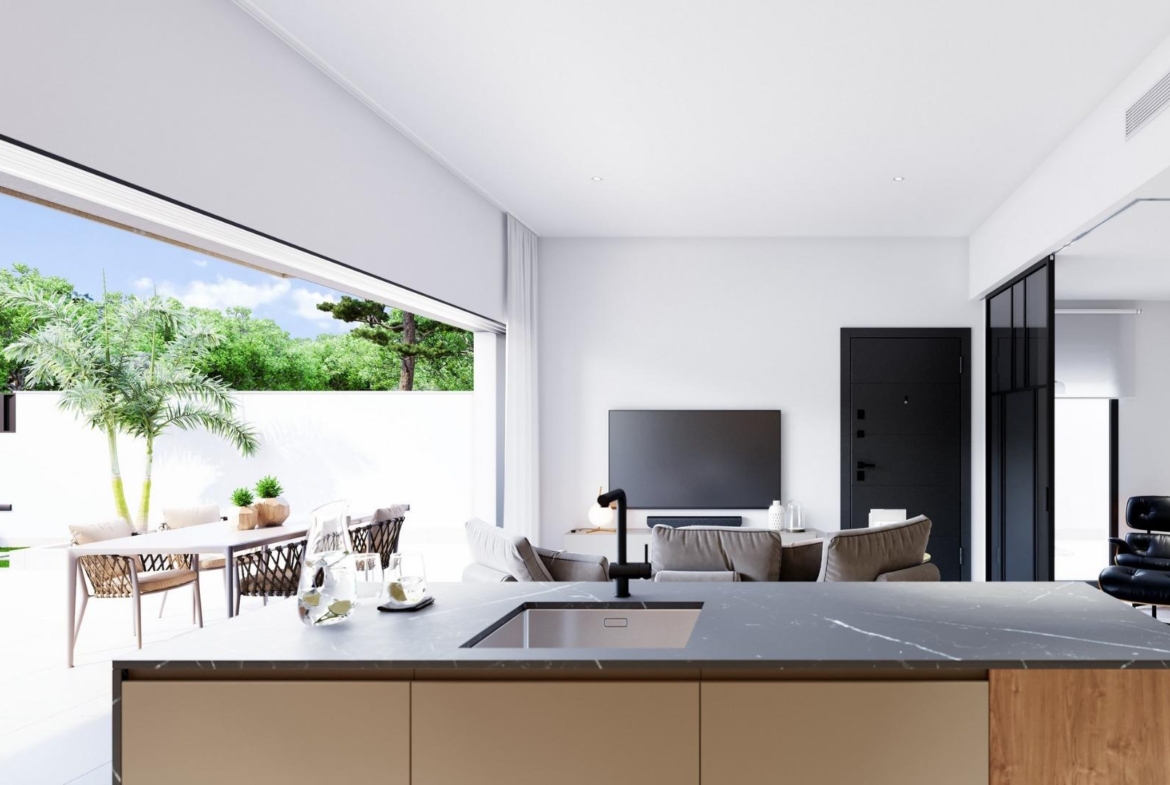 Bright and modern 3-bedroom ground floor home in Pilar de la Horadada with sleek kitchen island and sunlit garden terrace