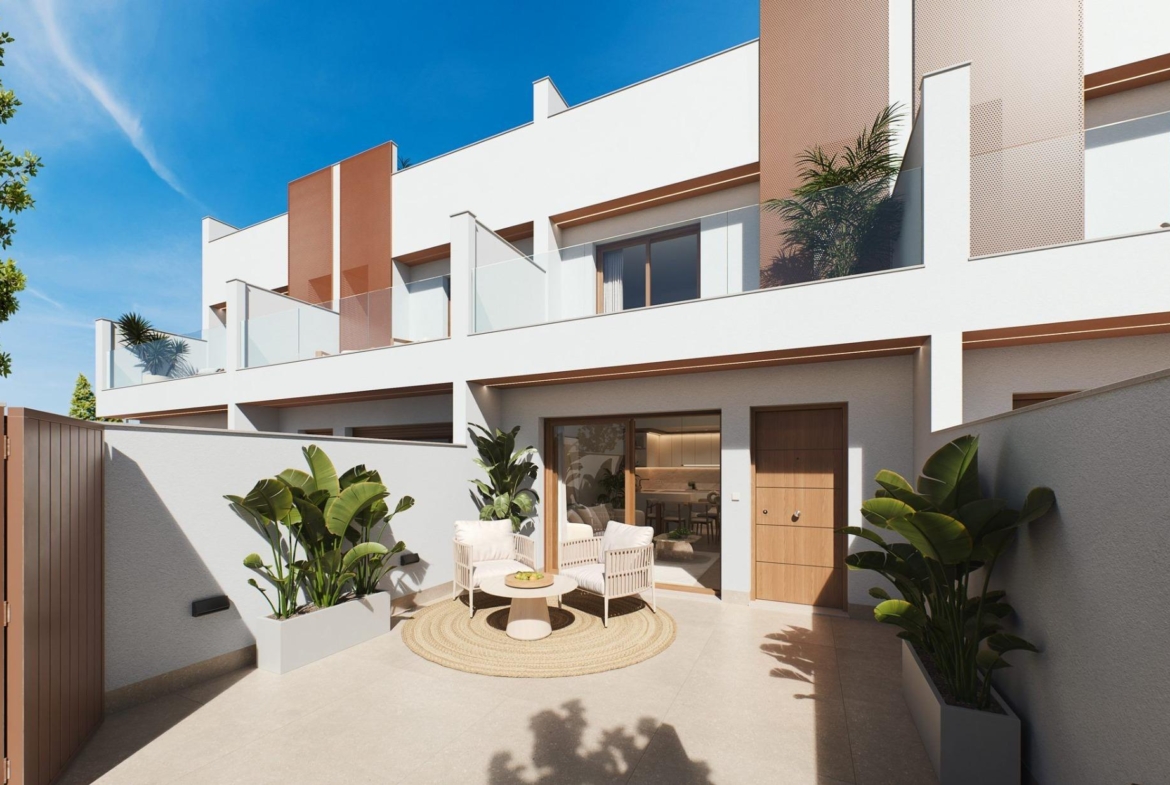 Contemporary-style townhouses with private swimming pools Ground-floor patio with rattan seating, potted plants and balcony above