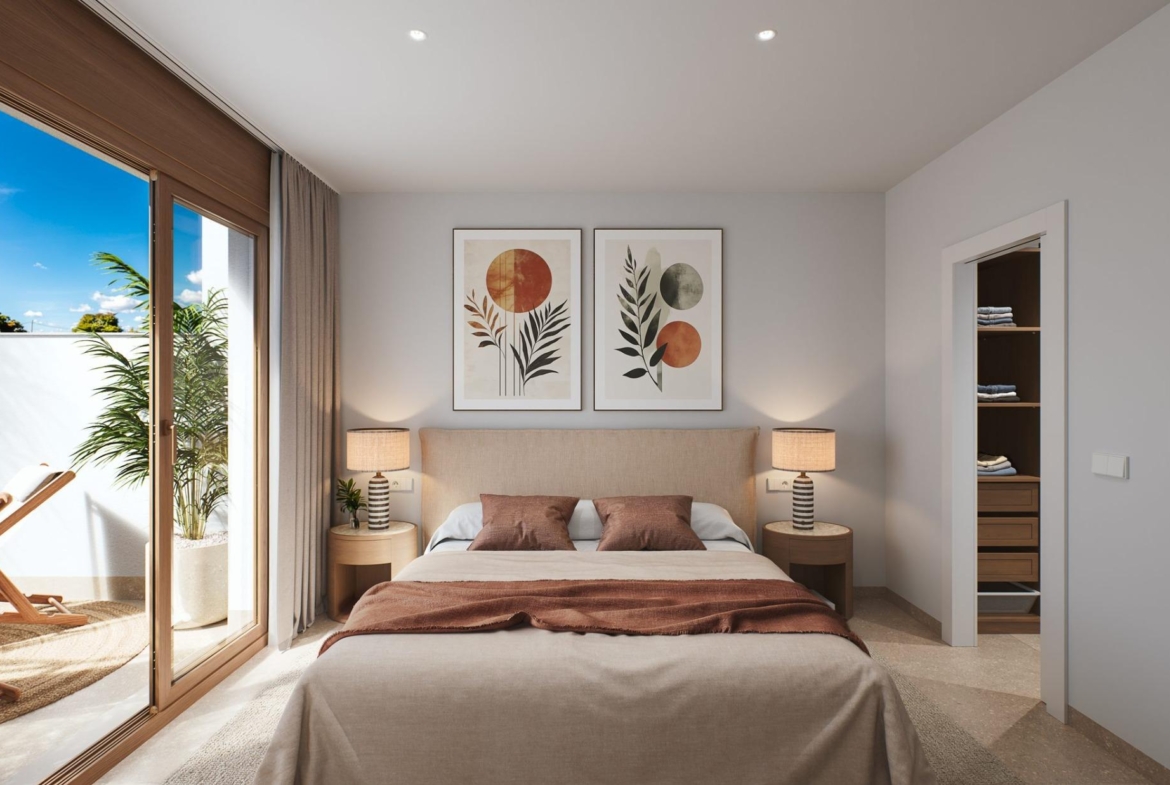 Contemporary-style-townhouses-with-private-swimming-pools-9 Bedroom with double bed, matching bedside lamps and sliding doors to a small terrace
