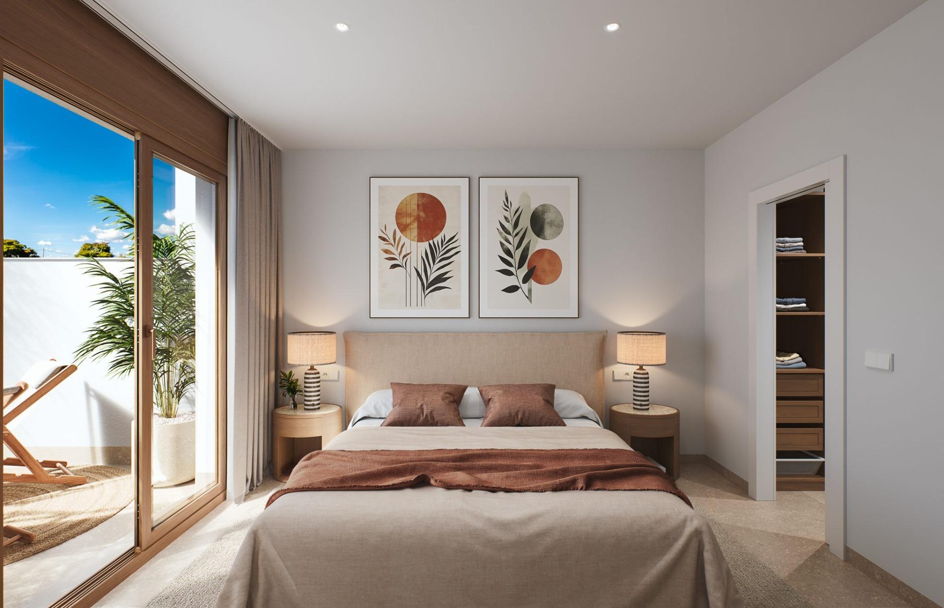 Contemporary-style-townhouses-with-private-swimming-pools-9 Bedroom with double bed, matching bedside lamps and sliding doors to a small terrace