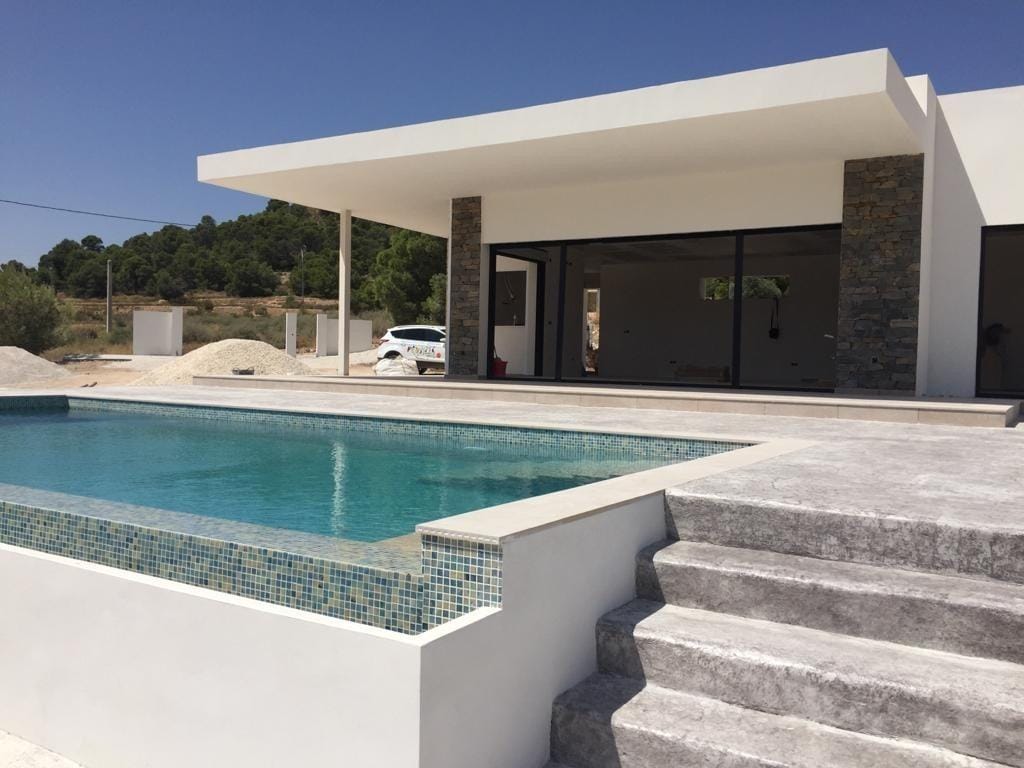 Pool steps beside a new build country villa in Pinoso, Alicante