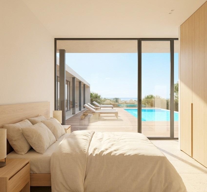 Bedroom overlooking the private pool at a country villa in Pinoso