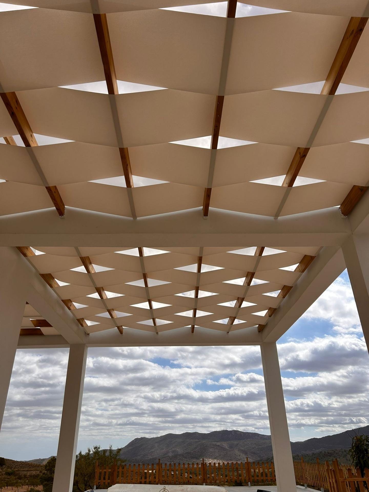 Custom-Built-New-Villas-in-Pinoso-Alicante-Spacious-Homes-in-Natural-Surroundings-11 Geometric shade panels above a villa terrace in Pinoso, Alicante