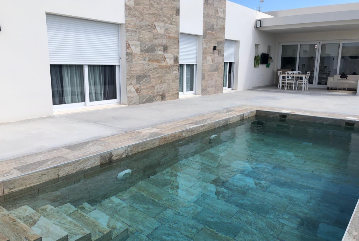 Private pool beside a new build country villa in Pinoso, Alicante