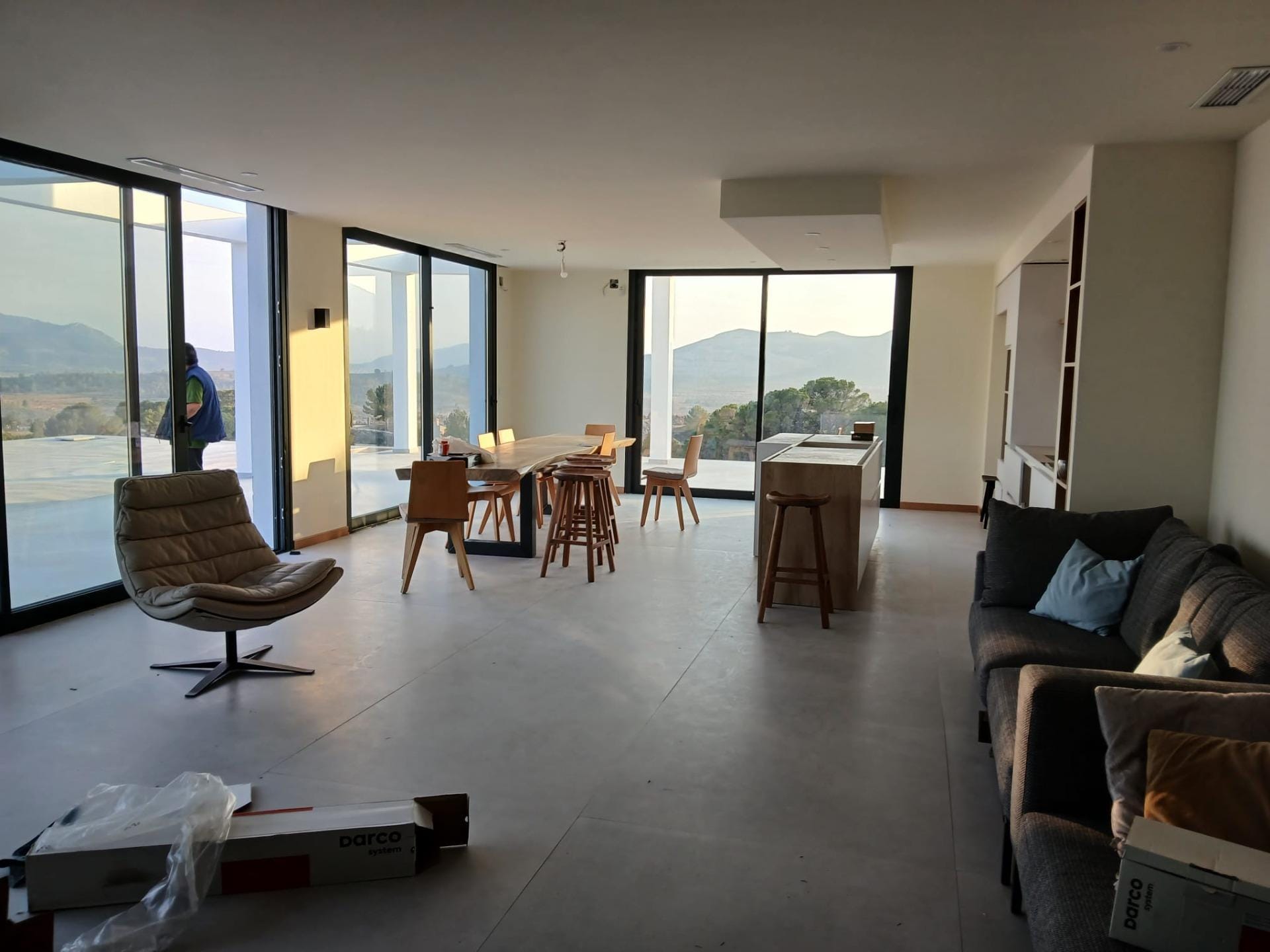 Custom-Built-New-Villas-in-Pinoso-Alicante-Spacious-Homes-in-Natural-Surroundings-15 Open-plan living and dining room with glass doors to the terrace in Pinoso, Alicante