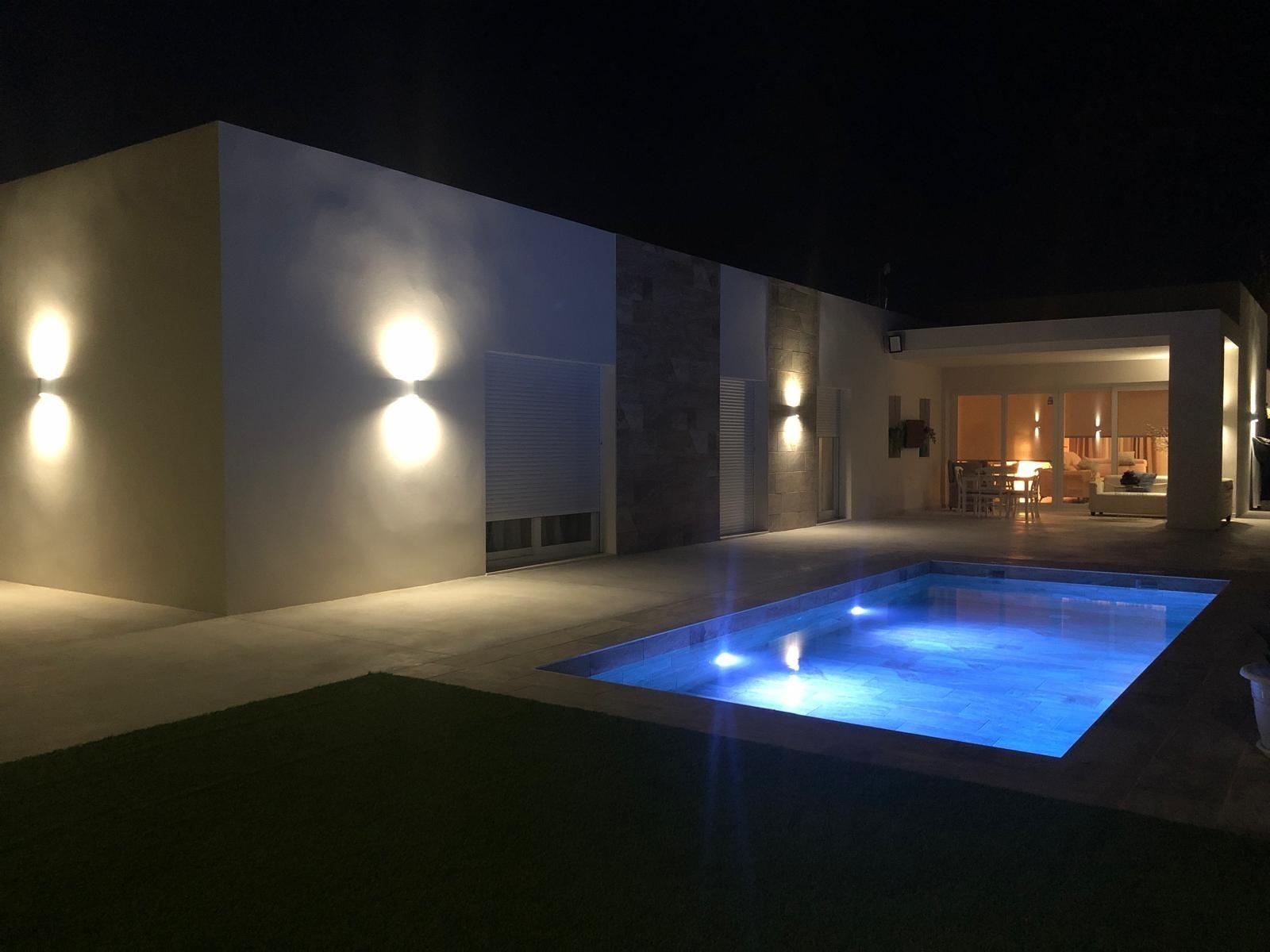 Illuminated pool and terrace at a villa with land in Pinoso
