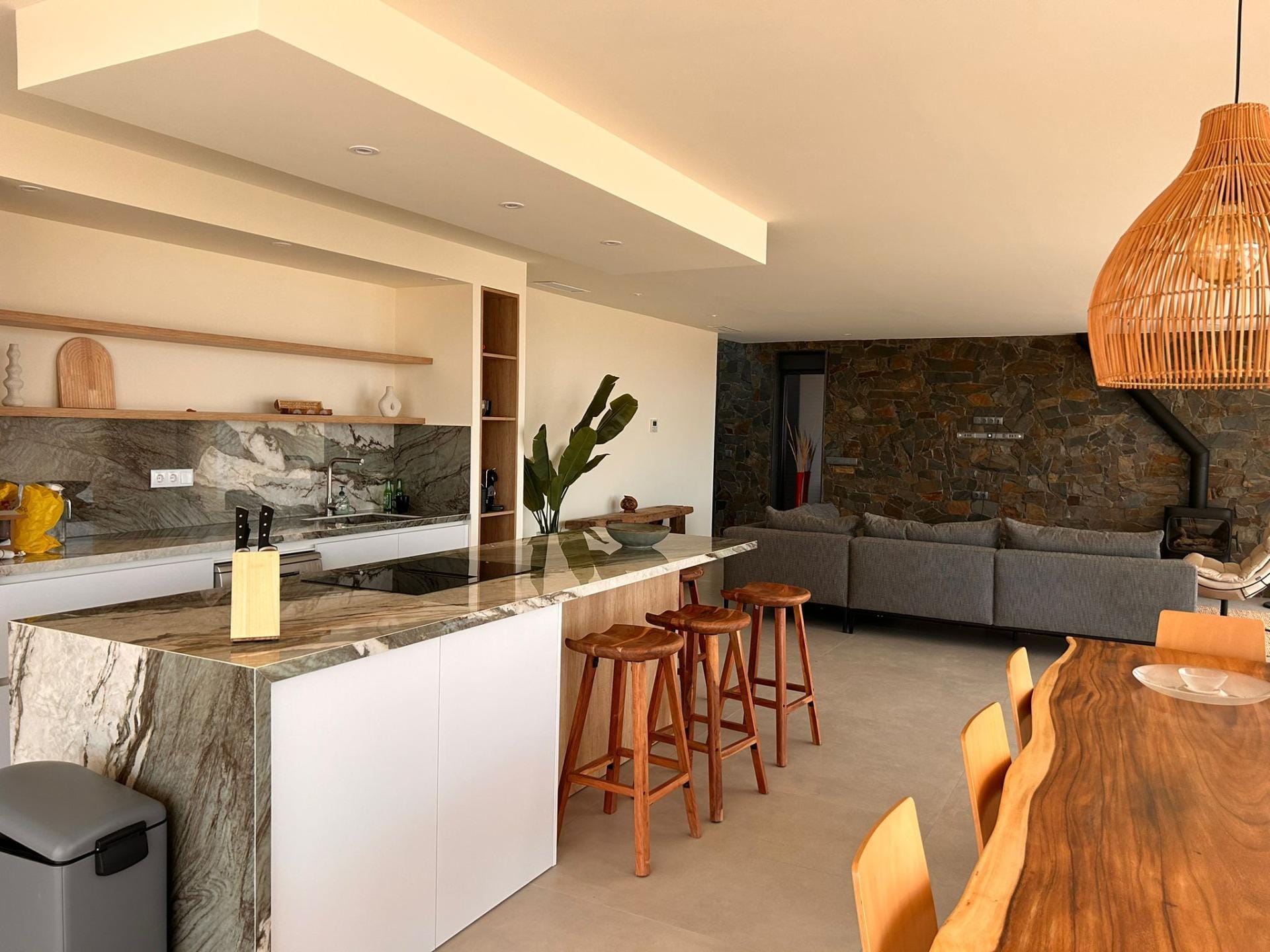 Custom-Built-New-Villas-in-Pinoso-Alicante-Spacious-Homes-in-Natural-Surroundings-17 Open kitchen with breakfast bar and adjoining living area in Pinoso, Alicante