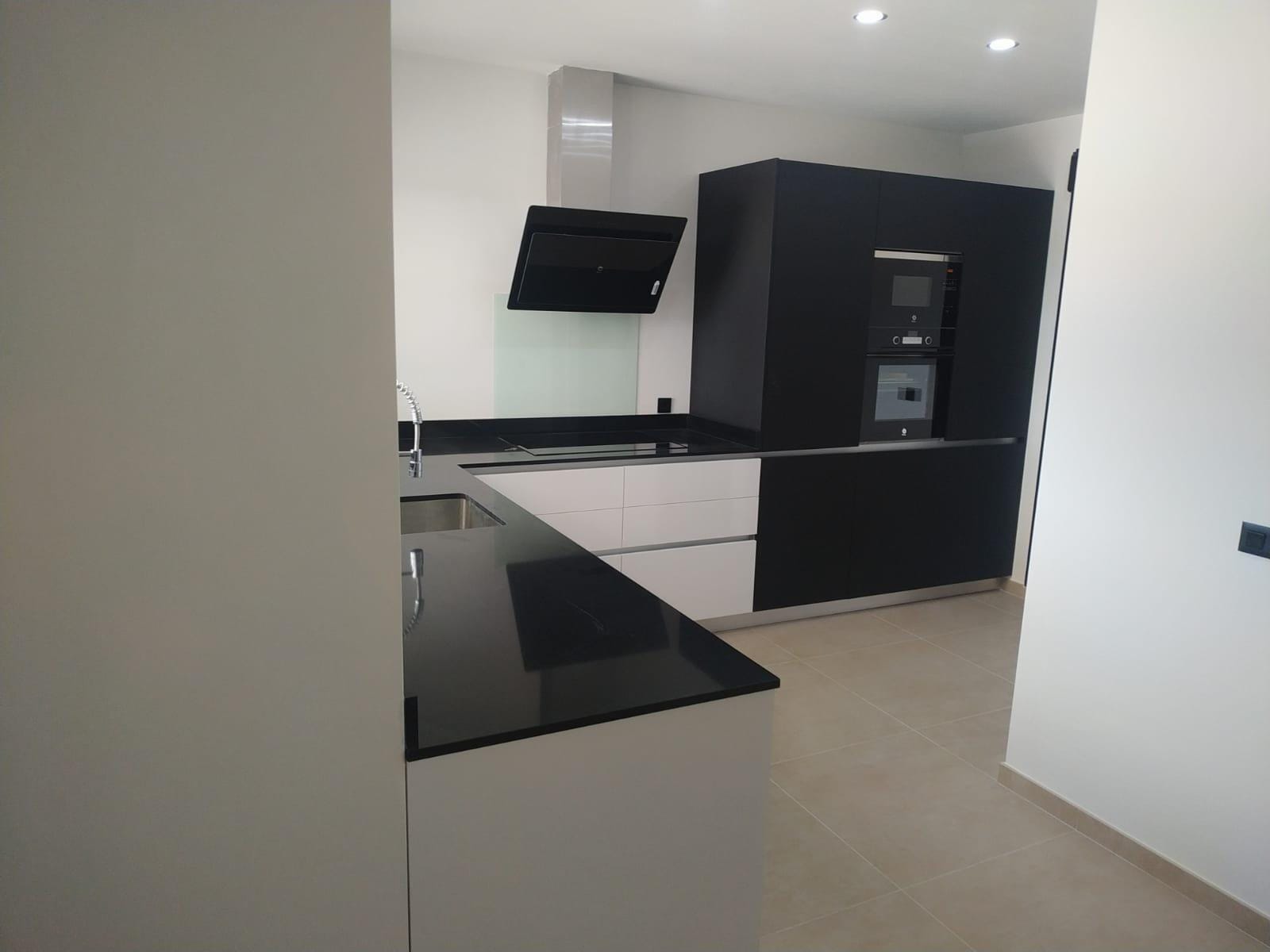Custom-Built-New-Villas-in-Pinoso-Alicante-Spacious-Homes-in-Natural-Surroundings-19 Kitchen peninsula and fitted cabinets in Pinoso, Alicante
