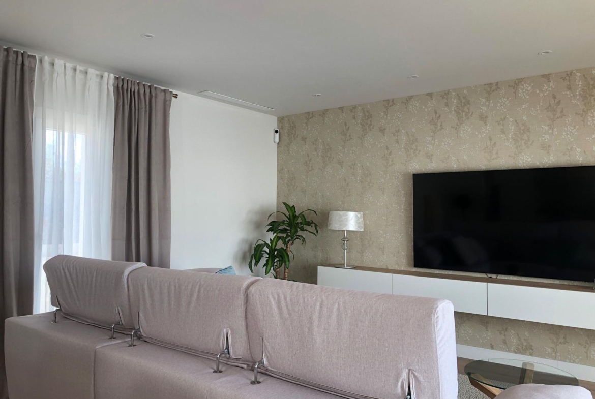 Living room with feature wall in a 3 bedroom Pinoso villa