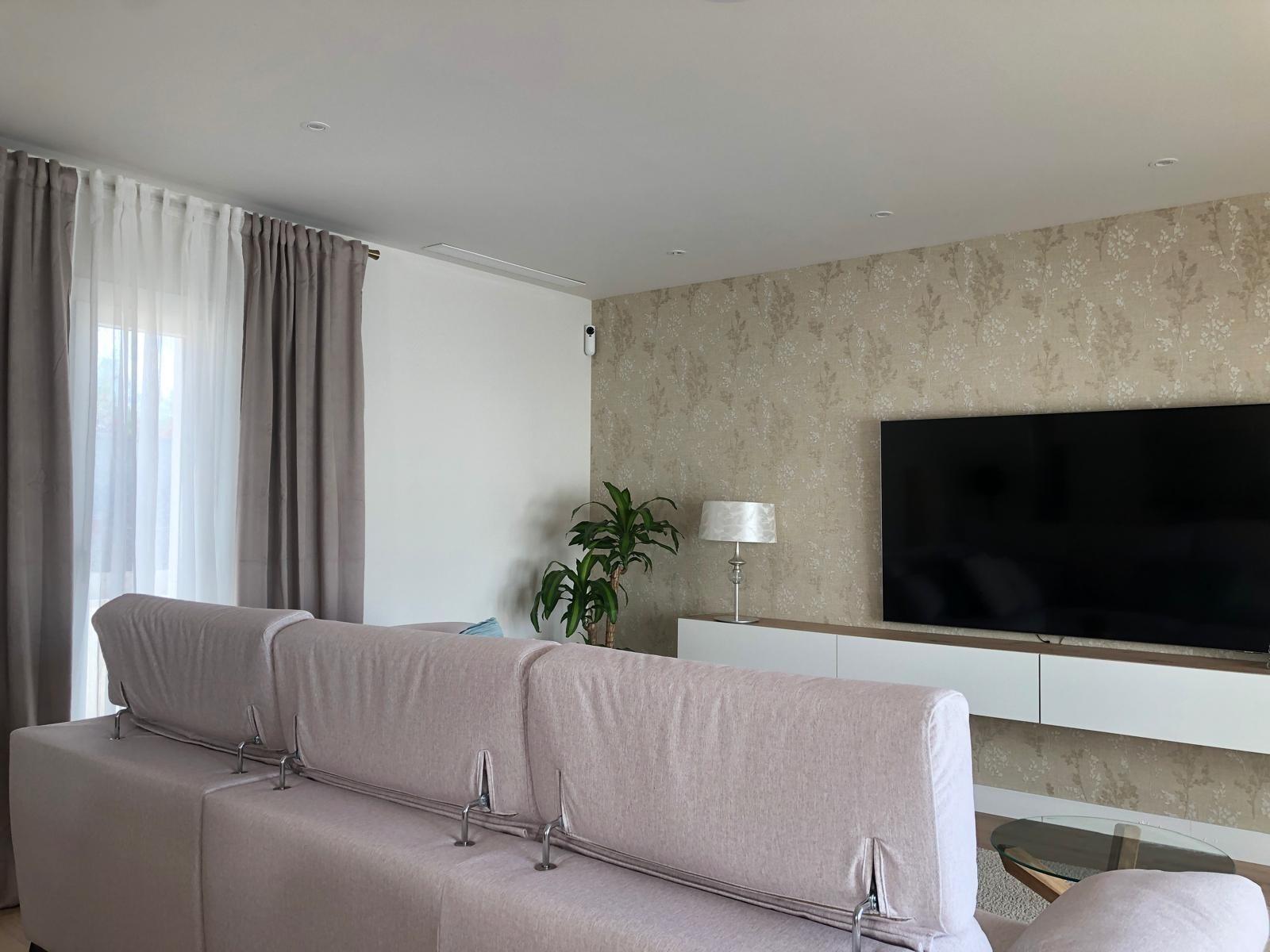 Living room with feature wall in a 3 bedroom Pinoso villa