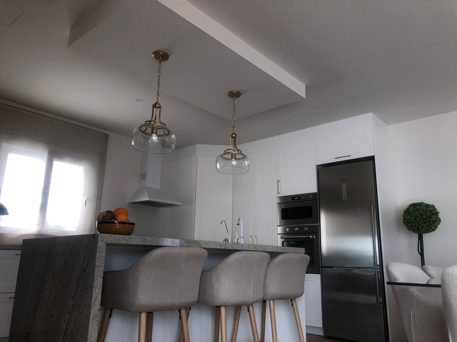 Kitchen island and dining area in a Pinoso country villa