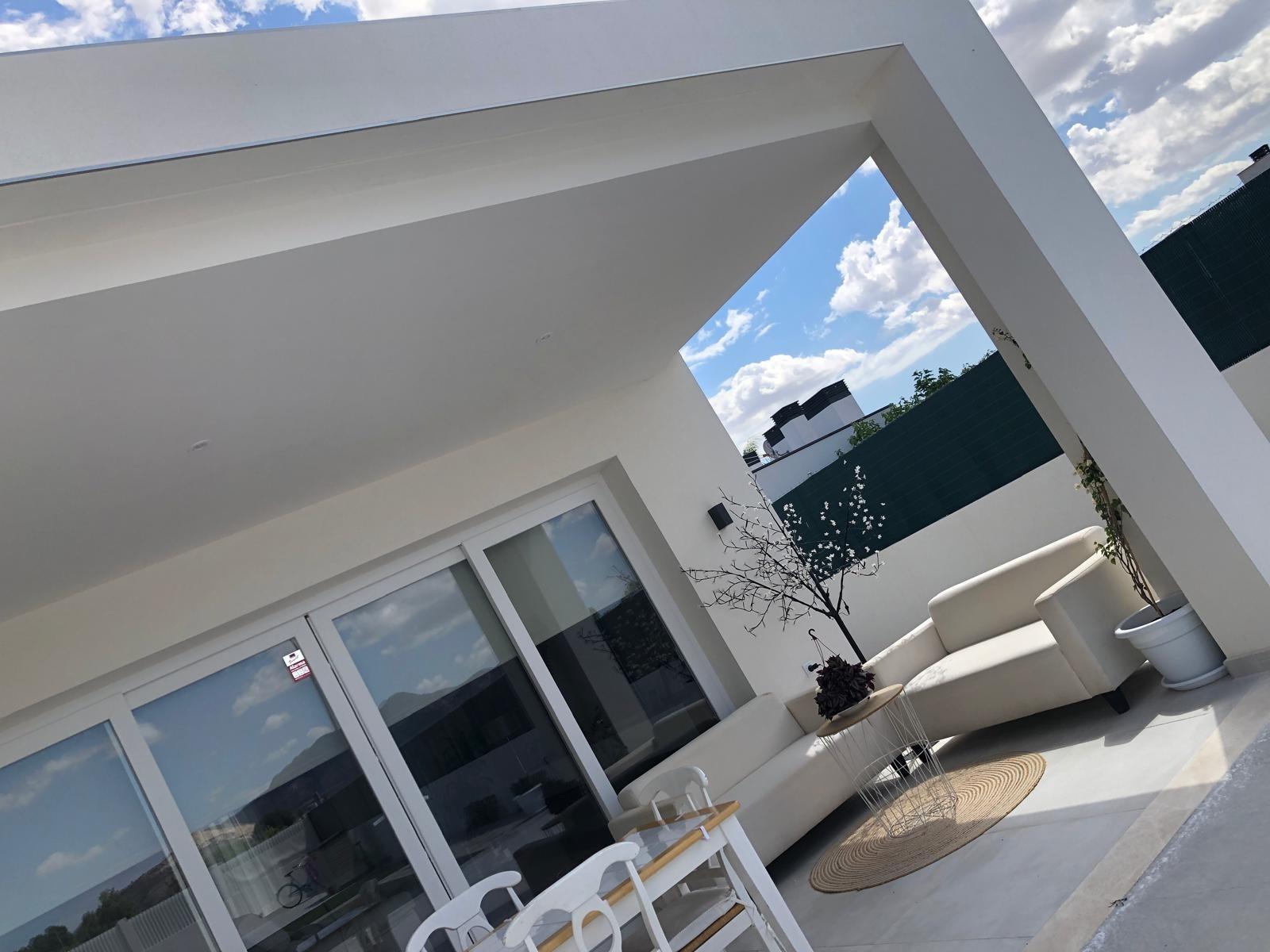 Covered outdoor dining terrace at a villa in Pinoso, Alicante