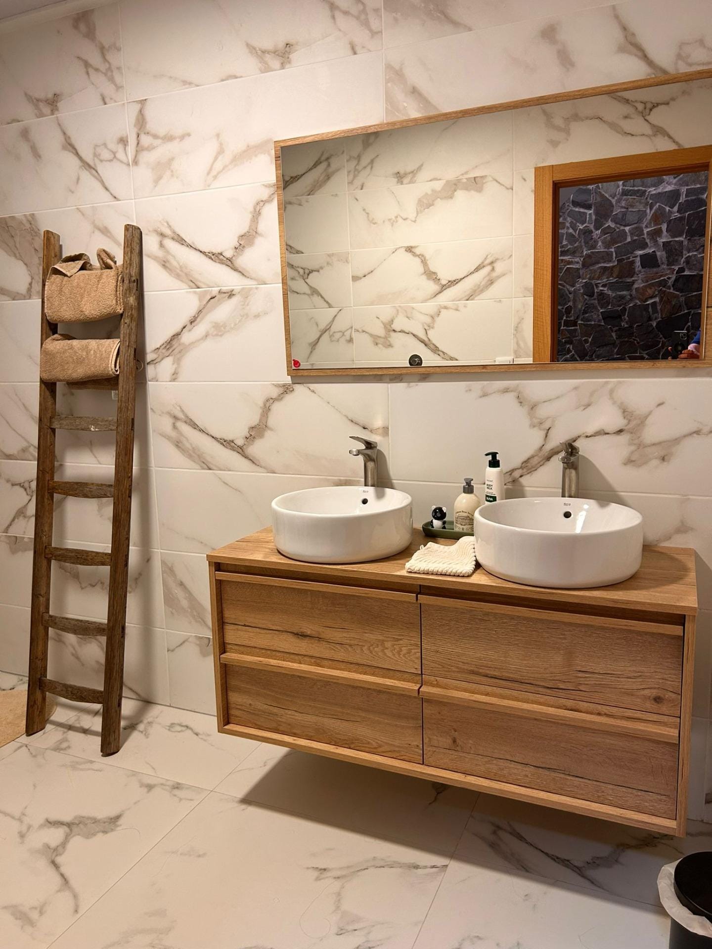 Custom-Built-New-Villas-in-Pinoso-Alicante-Spacious-Homes-in-Natural-Surroundings-23 Bathroom with twin countertop basins and a wooden vanity in Pinoso, Alicante