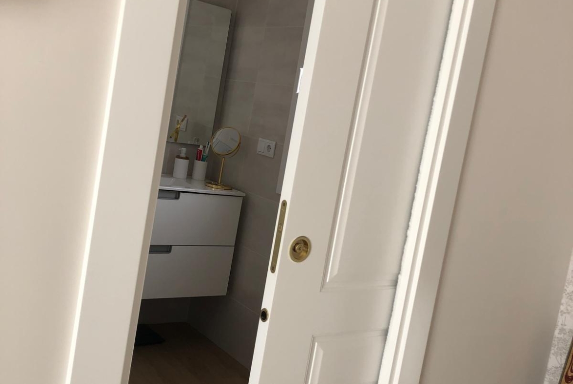 Bathroom doorway from a bedroom in a single-storey Pinoso villa