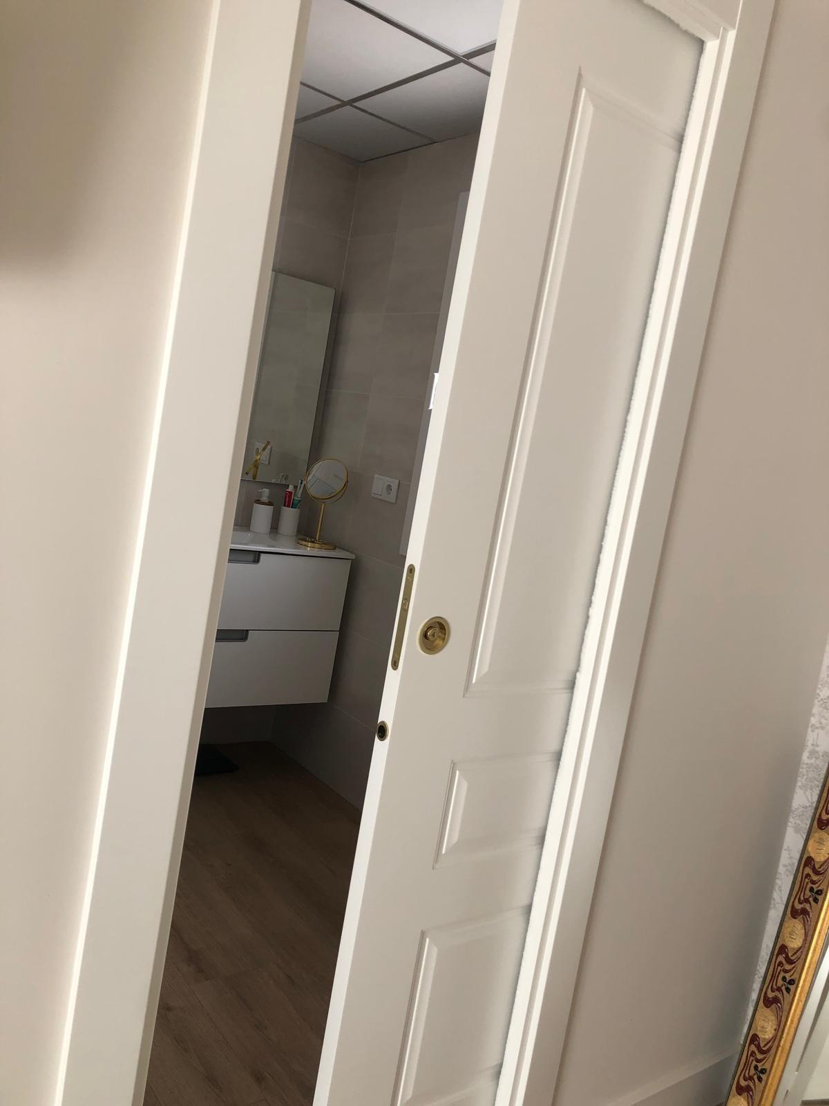 Bathroom doorway from a bedroom in a single-storey Pinoso villa