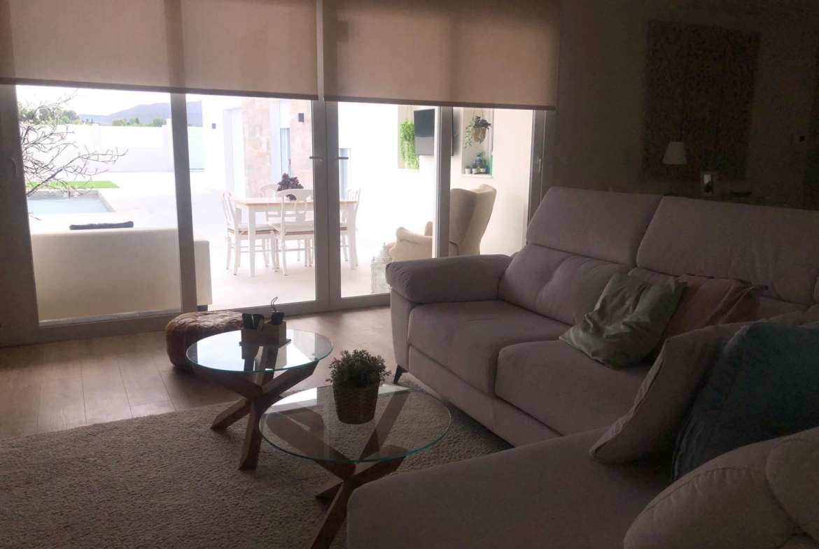 Living room opening to the terrace at a country villa in Pinoso