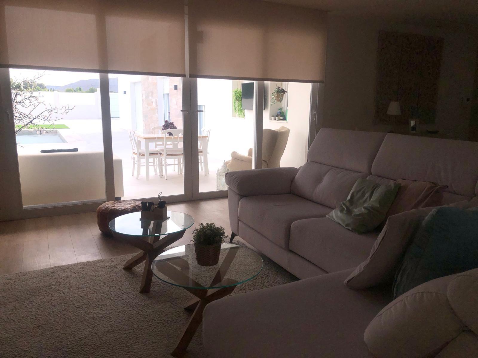 Living room opening to the terrace at a country villa in Pinoso