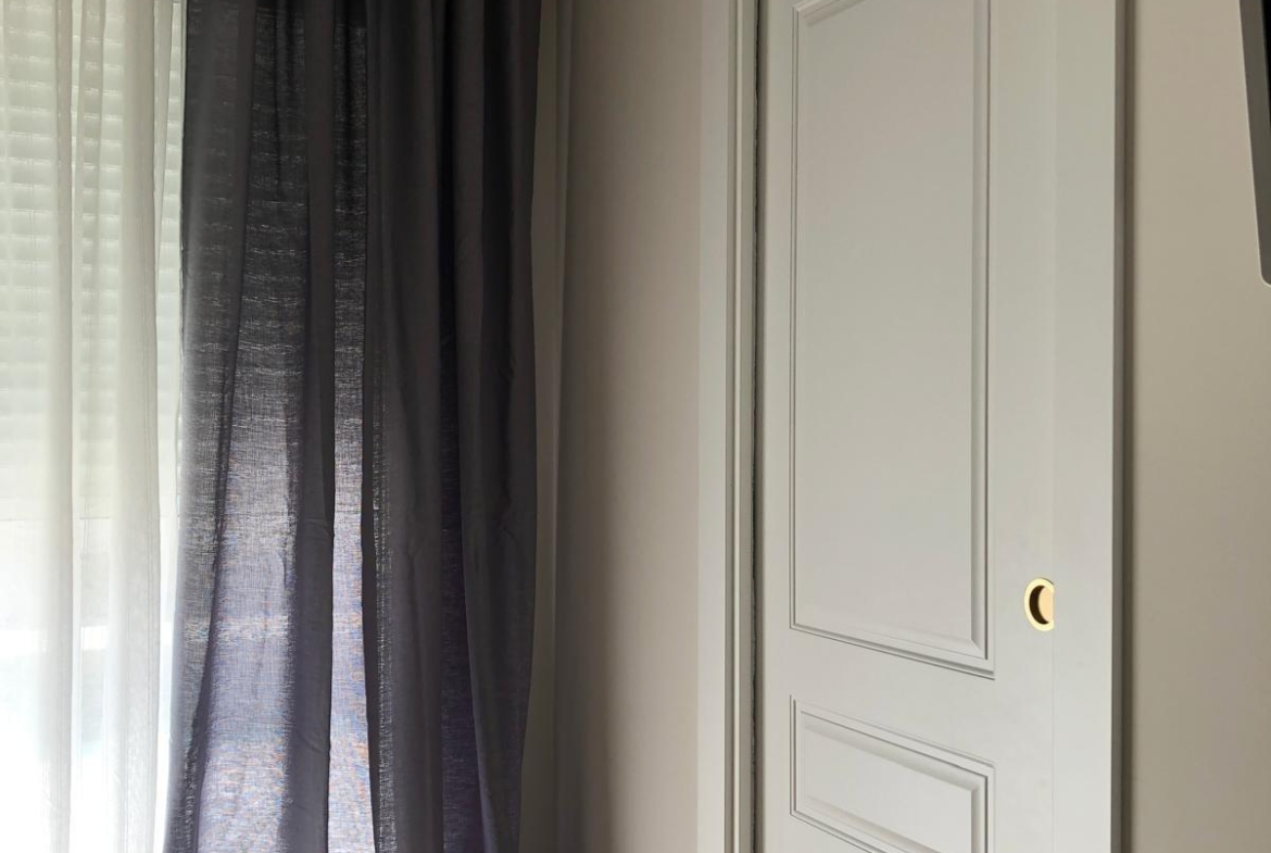 Built-in wardrobe and curtains in a bedroom of a Pinoso villa