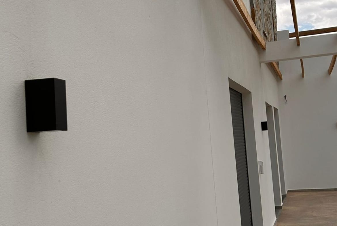 Exterior wall light and sheltered walkway beside the villa in Pinoso, Alicante