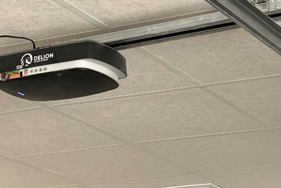 Ceiling-mounted motor and rail for a garage door in Pinoso, Alicante