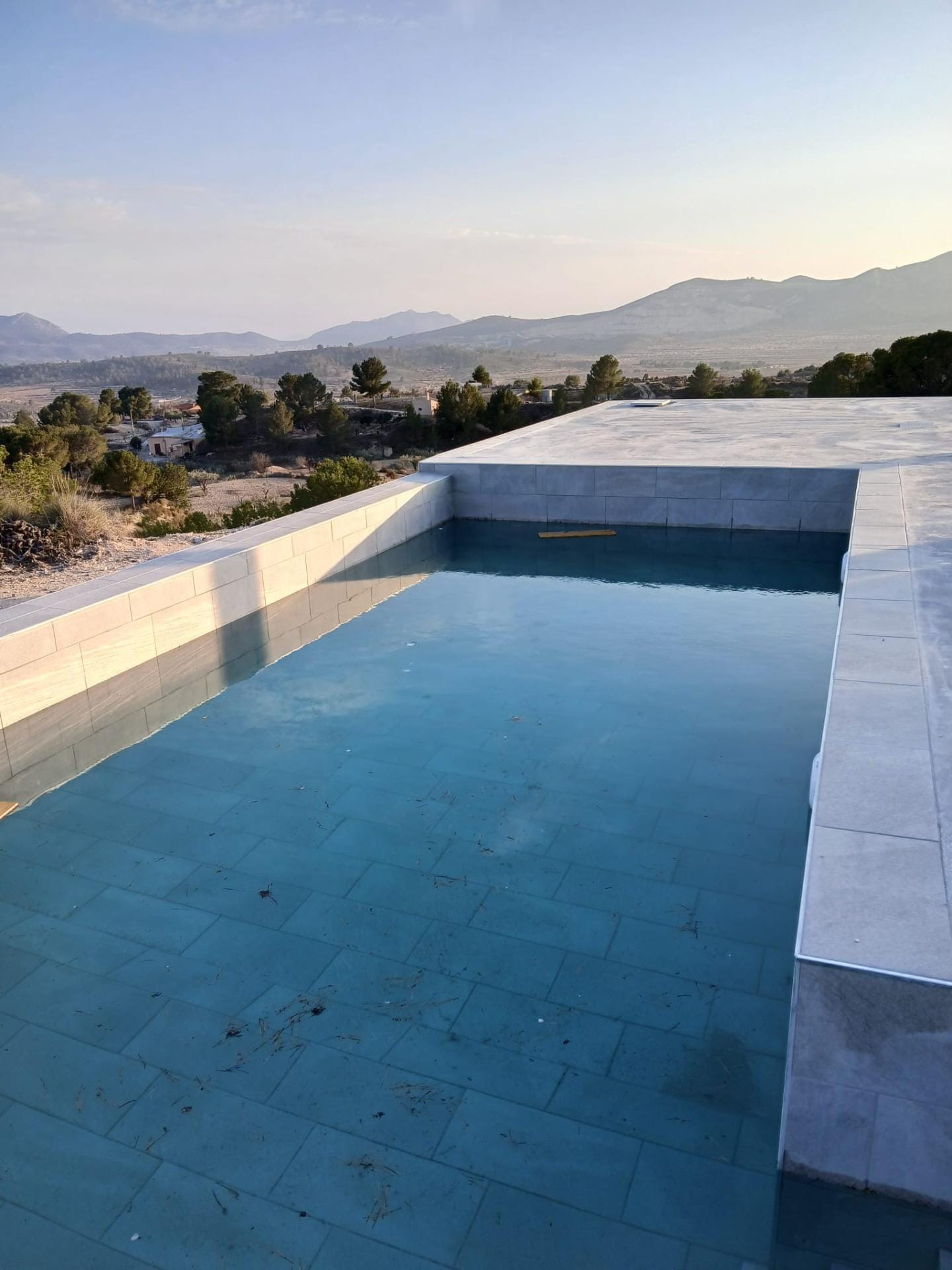 Custom-Built-New-Villas-in-Pinoso-Alicante-Spacious-Homes-in-Natural-Surroundings-7 Private swimming pool beside an open countryside terrace in Pinoso, Alicante