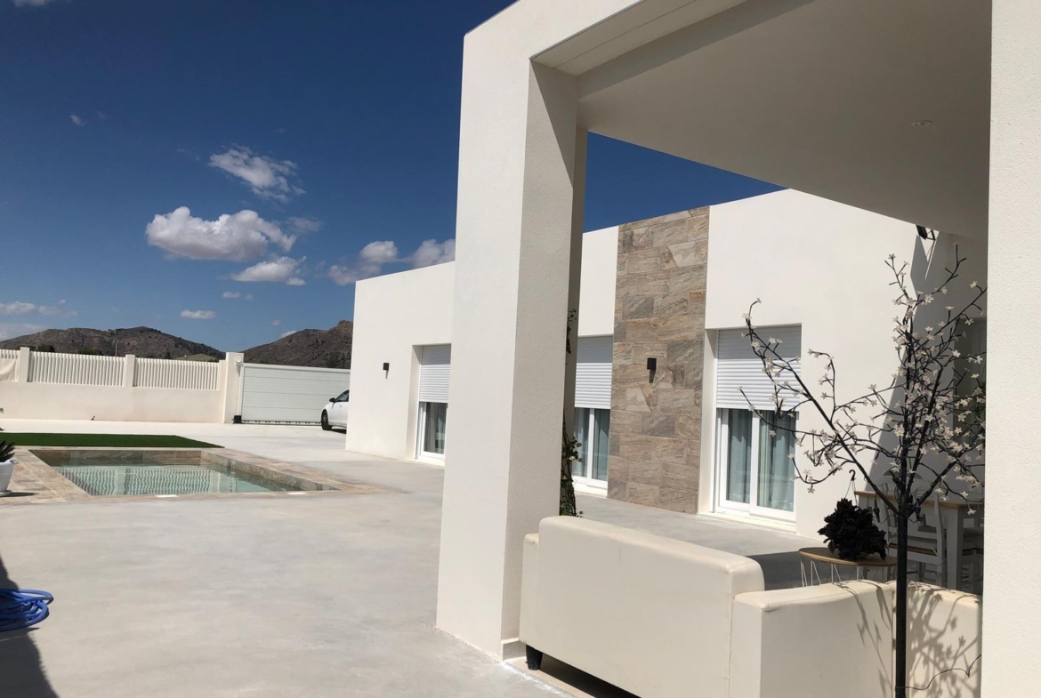 Covered side terrace at a new build villa in Pinoso, Alicante