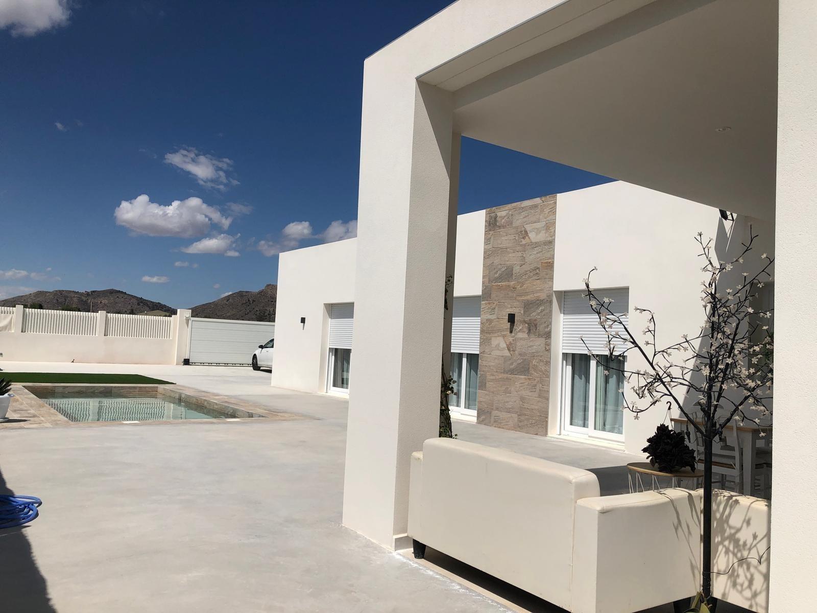 Covered side terrace at a new build villa in Pinoso, Alicante