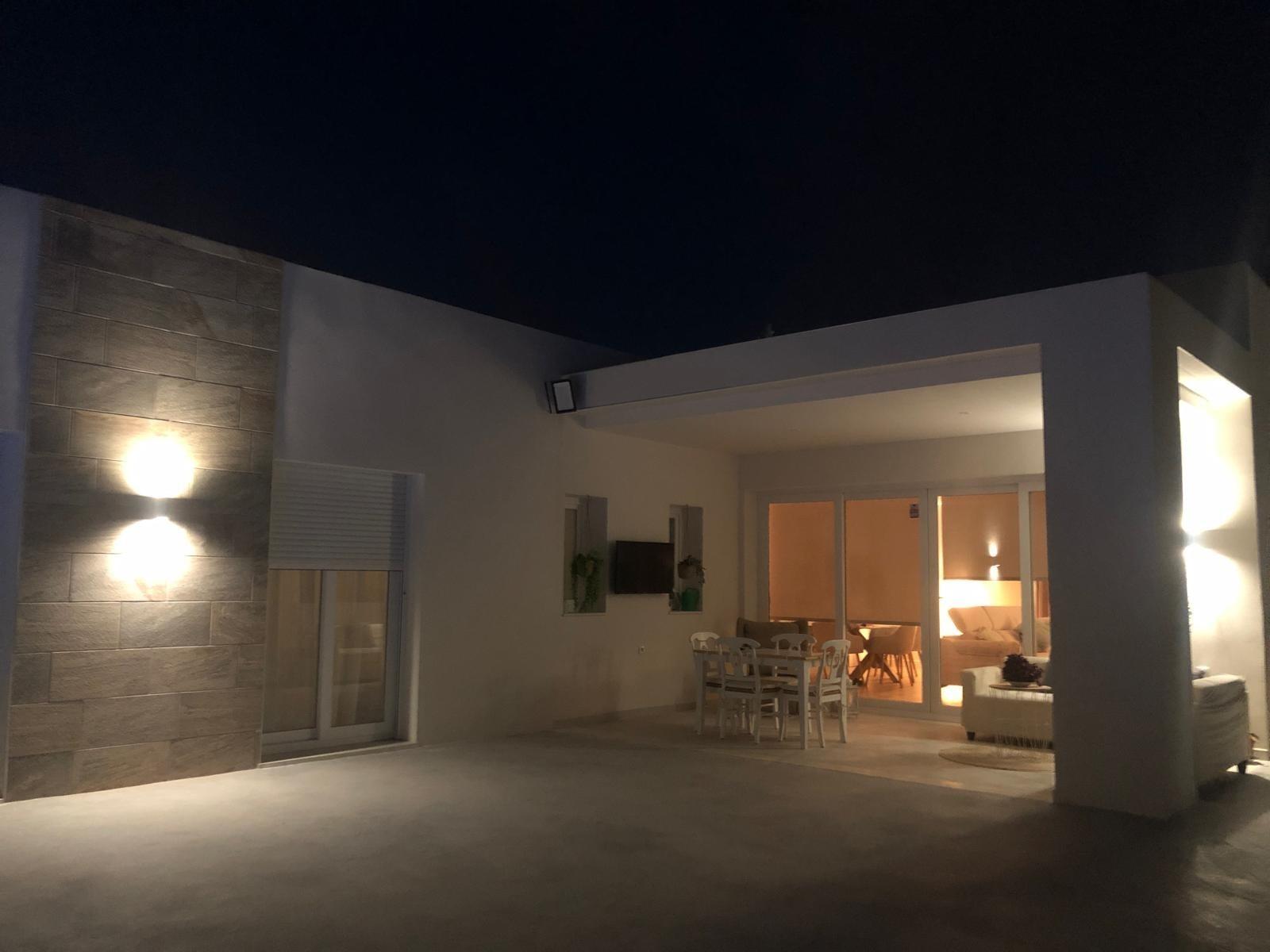Illuminated covered terrace and living room at a Pinoso villa