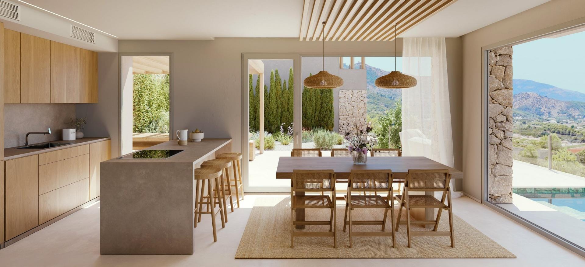 Fitted kitchen and dining area with direct access to the pool terrace