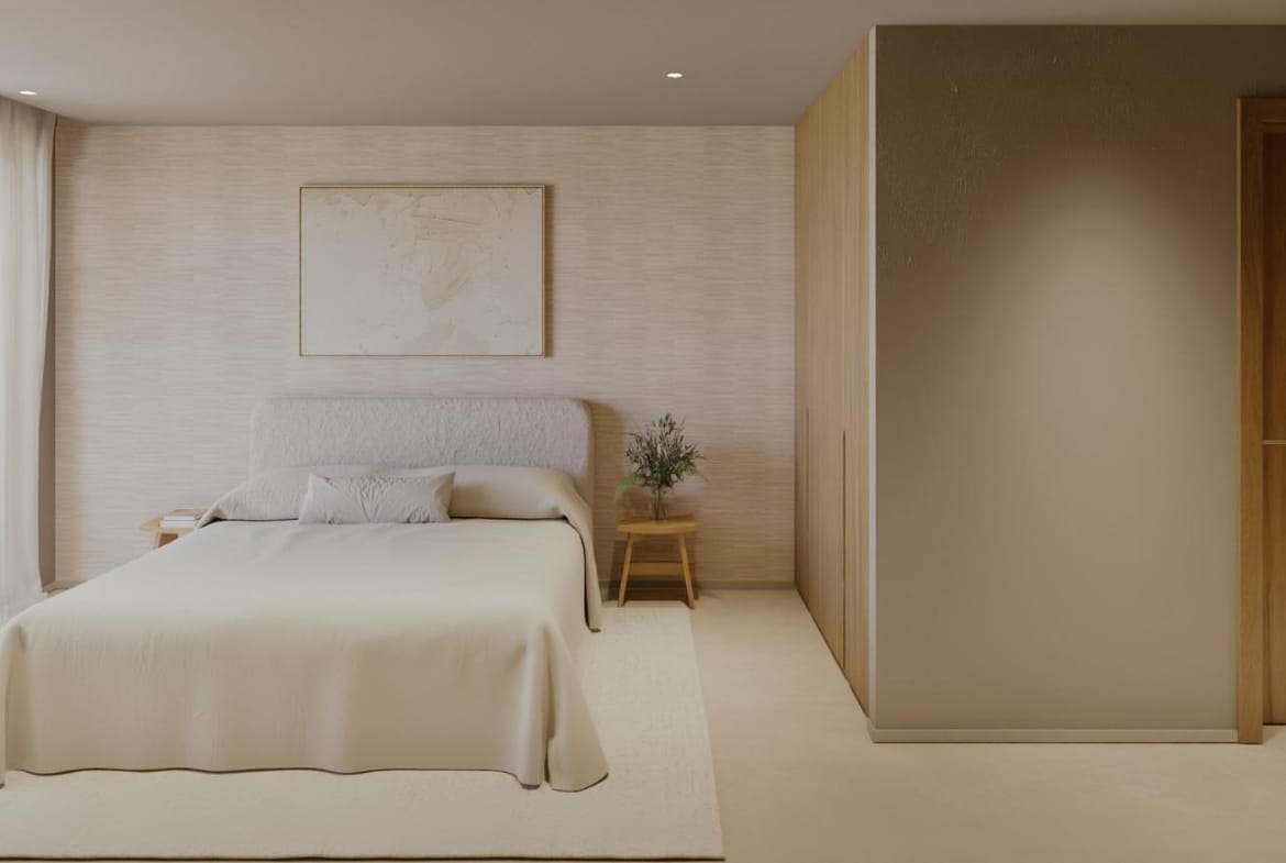 Main bedroom with fitted wardrobes and private terrace access